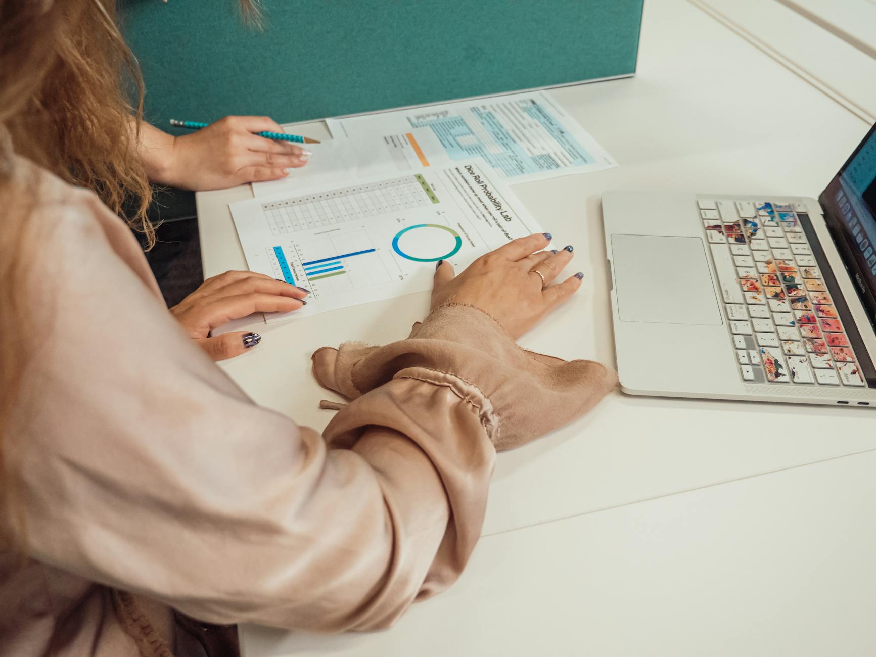 Professional analytics team collaborating on economic research projects